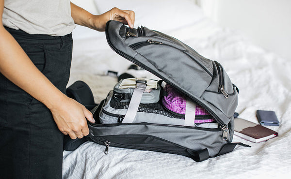 person using internal tie-down straps